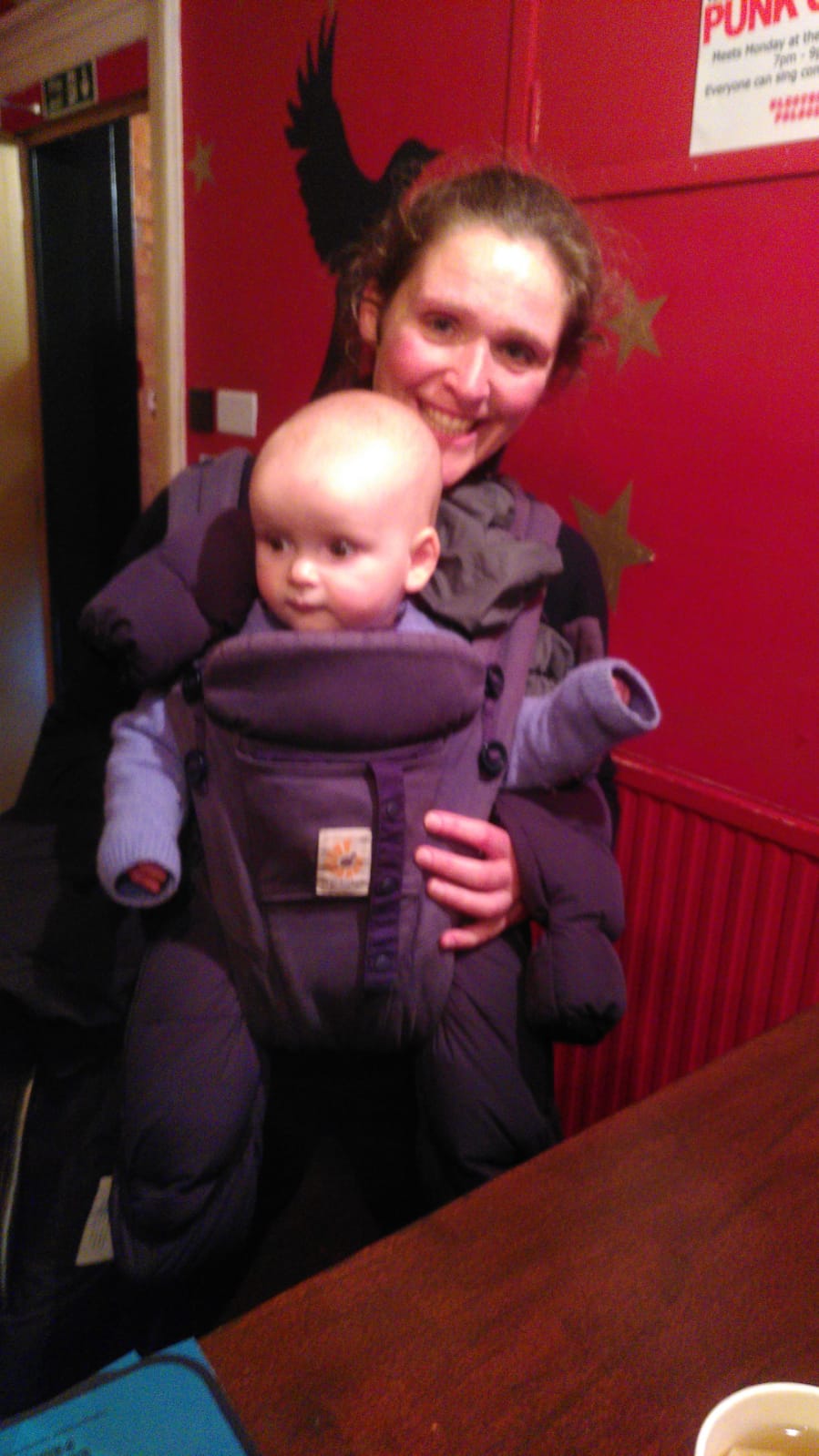Mother with baby in papoose